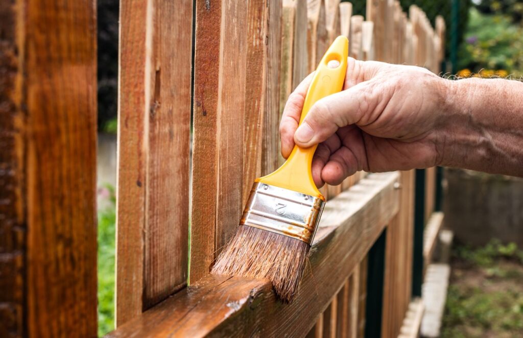 Painting picket fence by wood stain fence staining